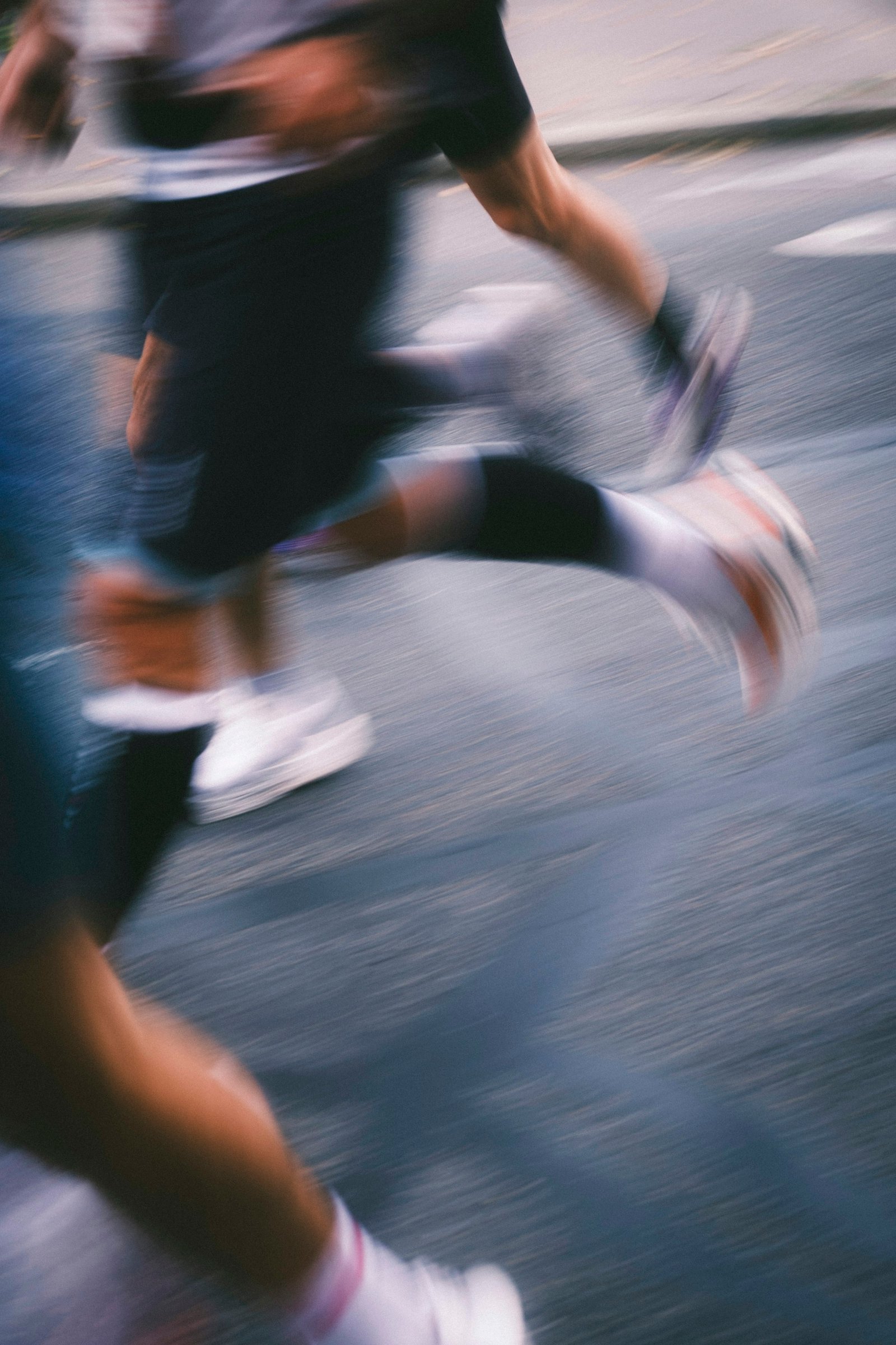 Hardlopers in beweging, motion blur